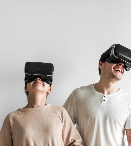 white-couple-experiencing-virtual-reality-with-vr-AJZC7DN.jpg